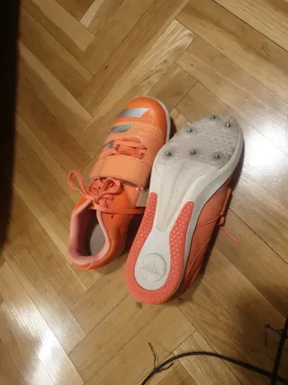 Zapatillas Atletismo Adidas Saltos Naranja unisex.