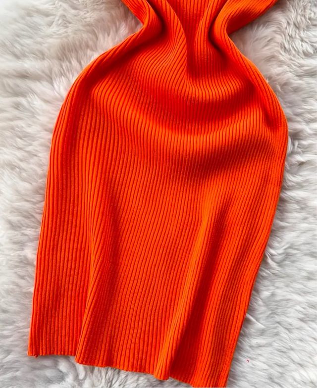 Vestito arancione asimmetrico in maglia
