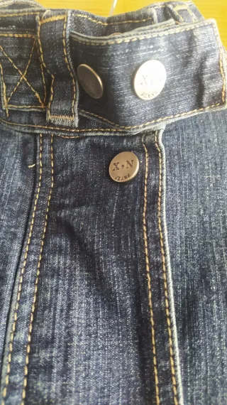 Abrigo vaquero azul con cinturón