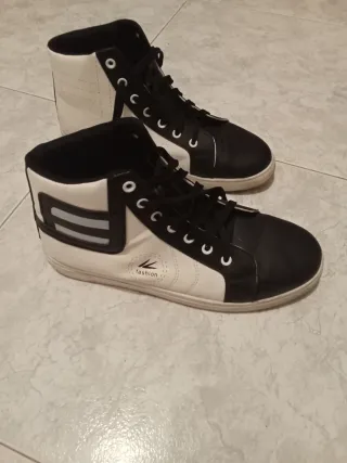 Botín unisex negro y blanco