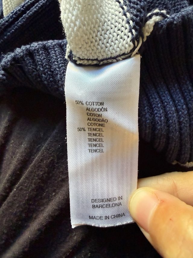 Jersey rayas oversize cuello pico