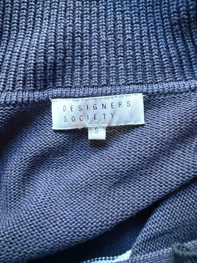 Jersey rayas oversize cuello pico