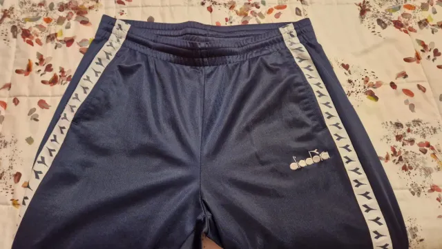 Tuta Diadora uomo rossa e blu