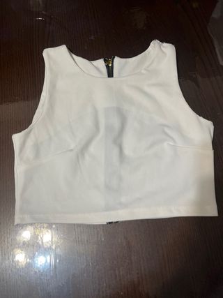 Top blanco sin mangas con cremallera