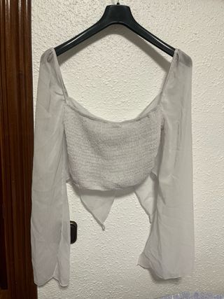 Blusa gris manga larga