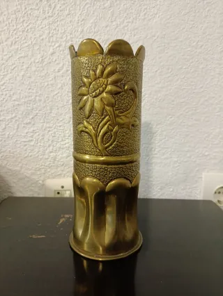 Arte de trincheras latón flor girasol