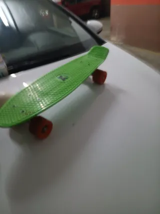 Patineta verde marca Mètical