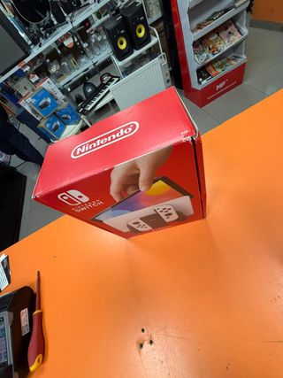 Nintendo Switch OLED + Funda
