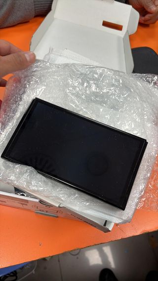 Nintendo Switch OLED + Funda