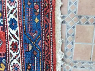 Preciosa alfombra persa antigua de lana