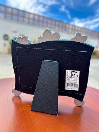 Marco de fotos azul con flores