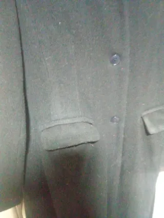 Chaqueta Giesswein y bolso cuero