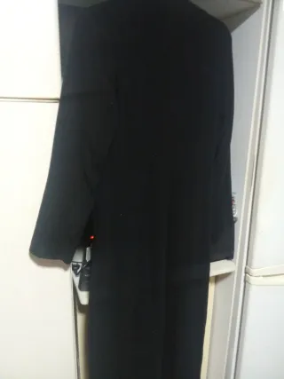 Chaqueta Giesswein y bolso cuero