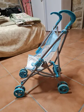 Carrelli e passeggini giocattolo per bambole