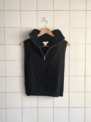 Chaleco H&M cuello alto cremallera negro