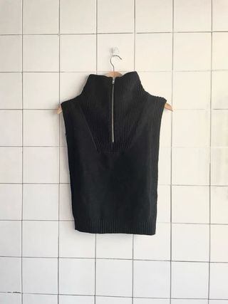 Chaleco H&M cuello alto cremallera negro