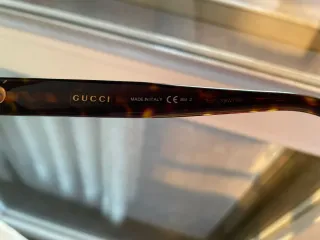 Occhiali da sole Gucci marroni e oro
