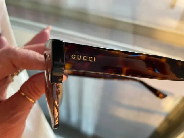 Occhiali da sole Gucci marroni e oro