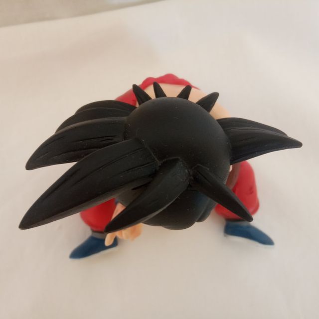 Statuina Dragon Ball Goku bambino seduto 9,5 cm