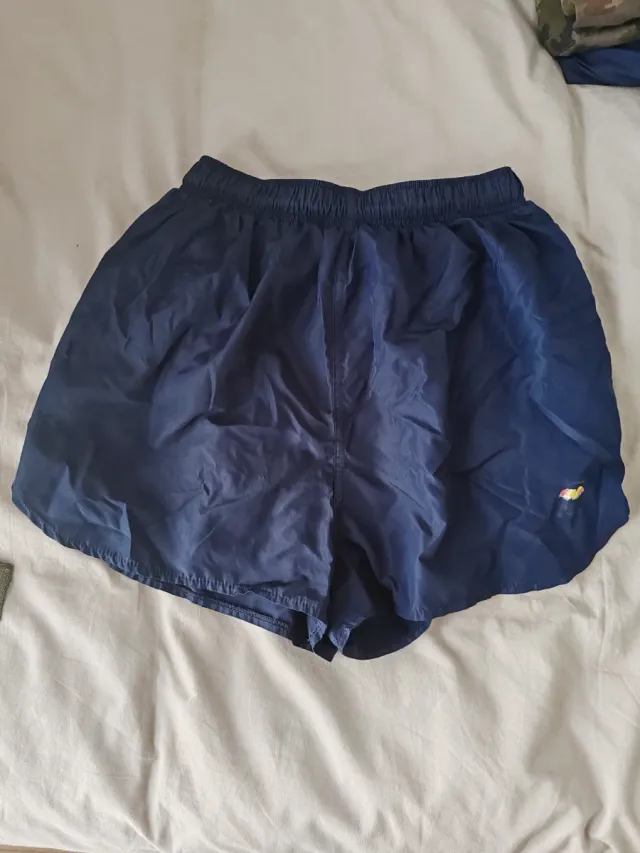 Pantalón corto deportivo azul