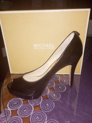 zapatos de marca su valor real es 140€