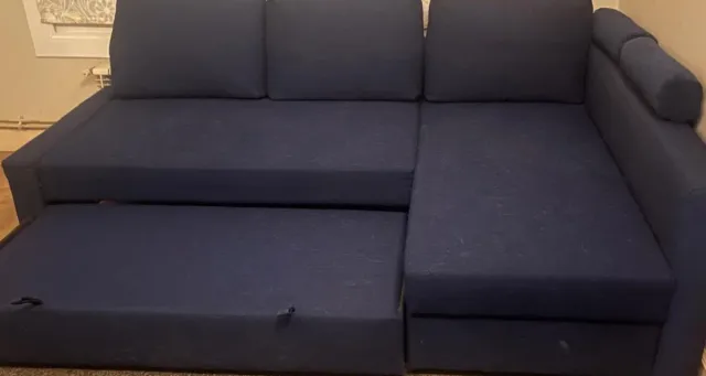 Sofá cama con chaise longue con almacenamiento