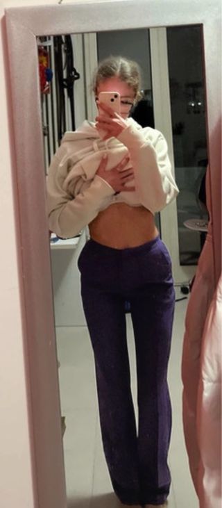 Pantaloni eleganti a zampa viola molto versatile