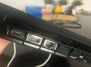 PS4 Negra + Mando Blanco