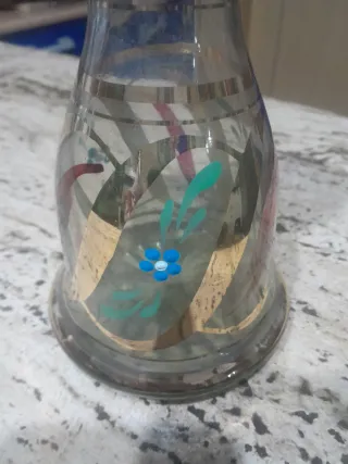 Bottiglia vintage decorata con tappo