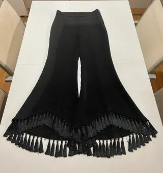 Pantalones palazzo negros con flecos