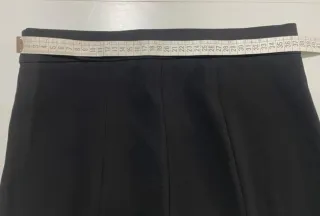 Pantalones palazzo negros con flecos