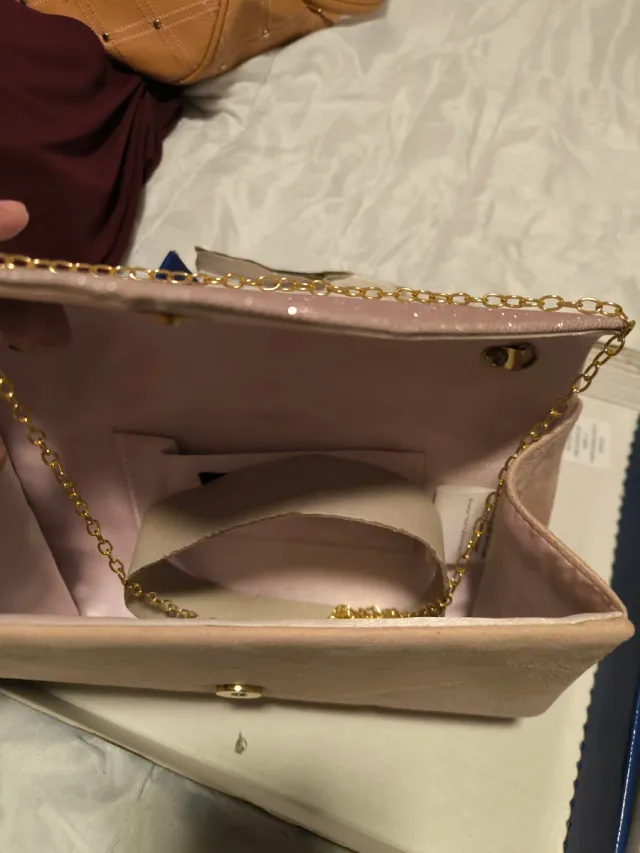 Zapatos de tacón y bolso rosa palo, una vez usado