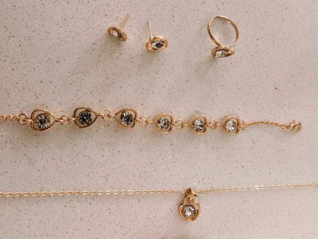 Set parure collana, bracciale, anello orologio