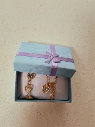 Set parure collana, bracciale, anello orologio