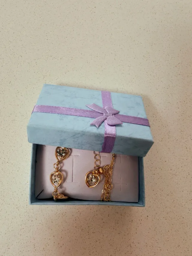 Set parure collana, bracciale, anello orologio