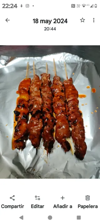 Barbacoa a gas con pietra vulcanica nera/argentata