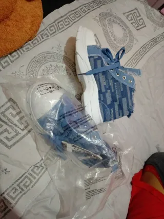 Botines vaqueros con detalles