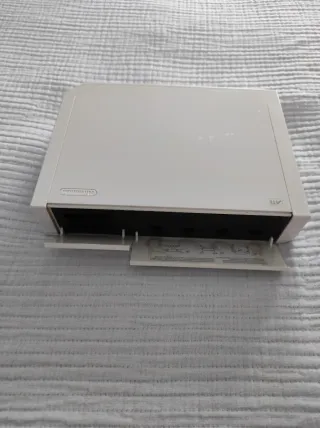 Nintendo Wii + Wii Sports Resort + Accesorios