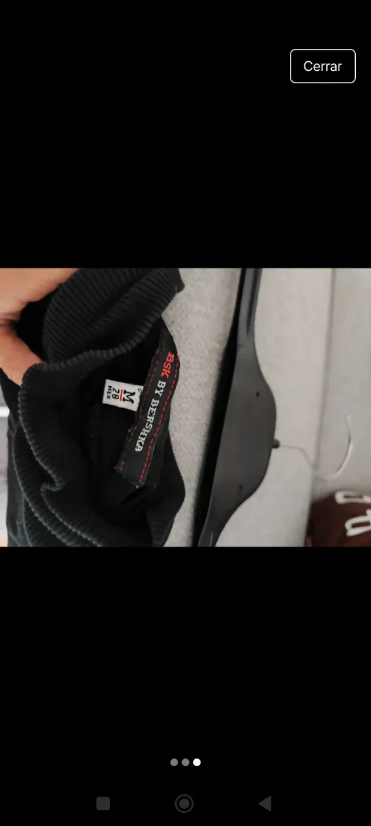 Jersey negro cuello alto