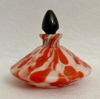 Bottiglia profumo vetro arancio e bianco