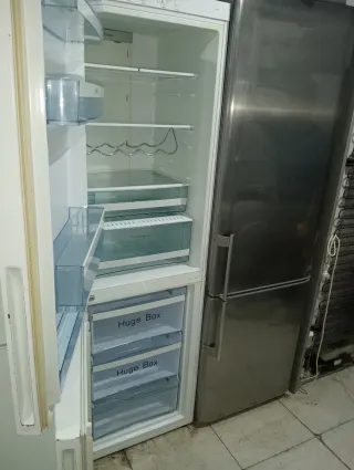 Nevera Haier Blanca y Acero Inox