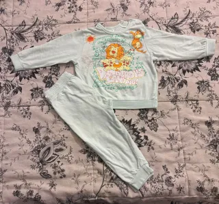 Pigiama bimbo/a con leoni e scimmie