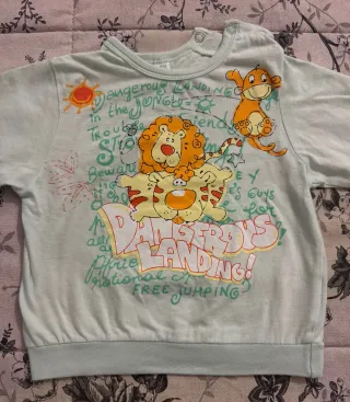 Pigiama bimbo/a con leoni e scimmie