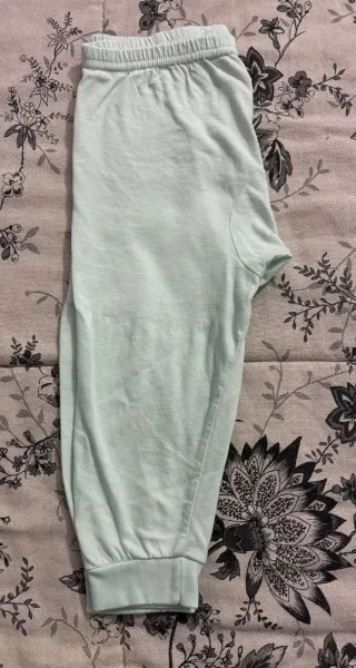 Pigiama bimbo/a con leoni e scimmie