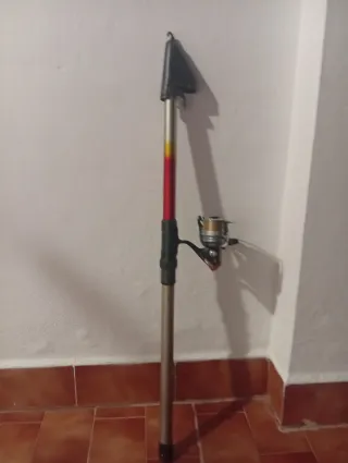 Caña de pescar buena marca y carrete Daiwan