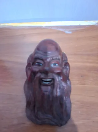 Figura tallada madera longan