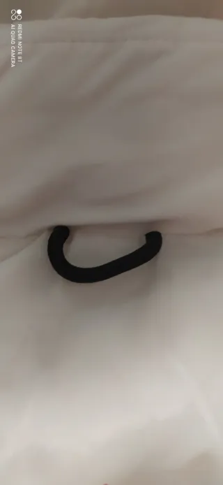 Chaleco largo beige con capucha