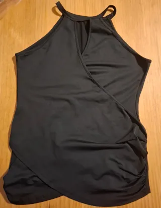 BLUSA hombros desciniertos negra