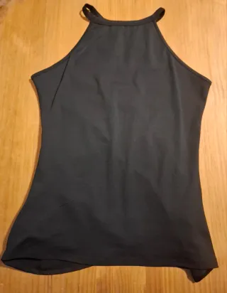 BLUSA hombros desciniertos negra