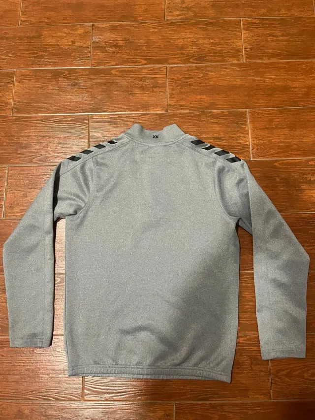 Sudadera Hummel gris con cremallera. UD LAS PALMAS